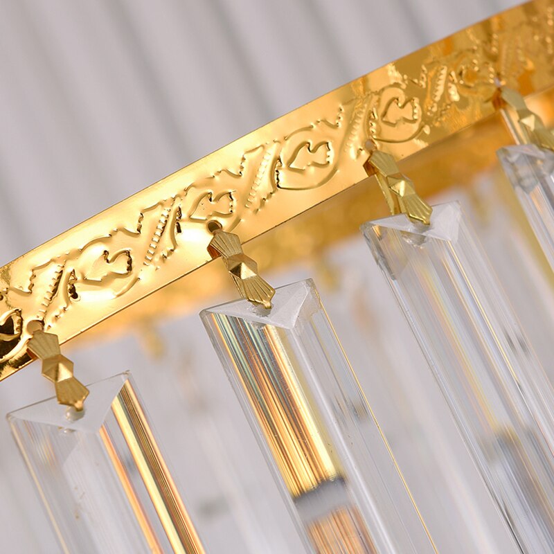 Detailed view of the tiered spiral crystal structure of the VORELLI® Manhattan staircase chandelier in a luxury interior