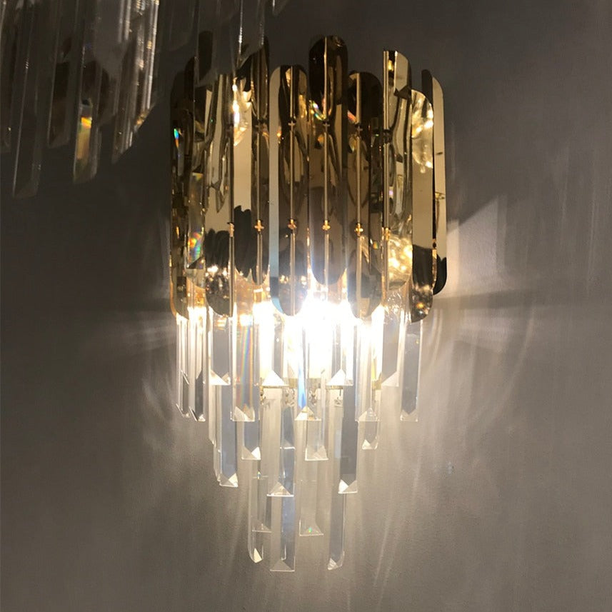 VORELLI Manhattan Wall Light casting dramatic reflections and warm ambient glow across a modern wall