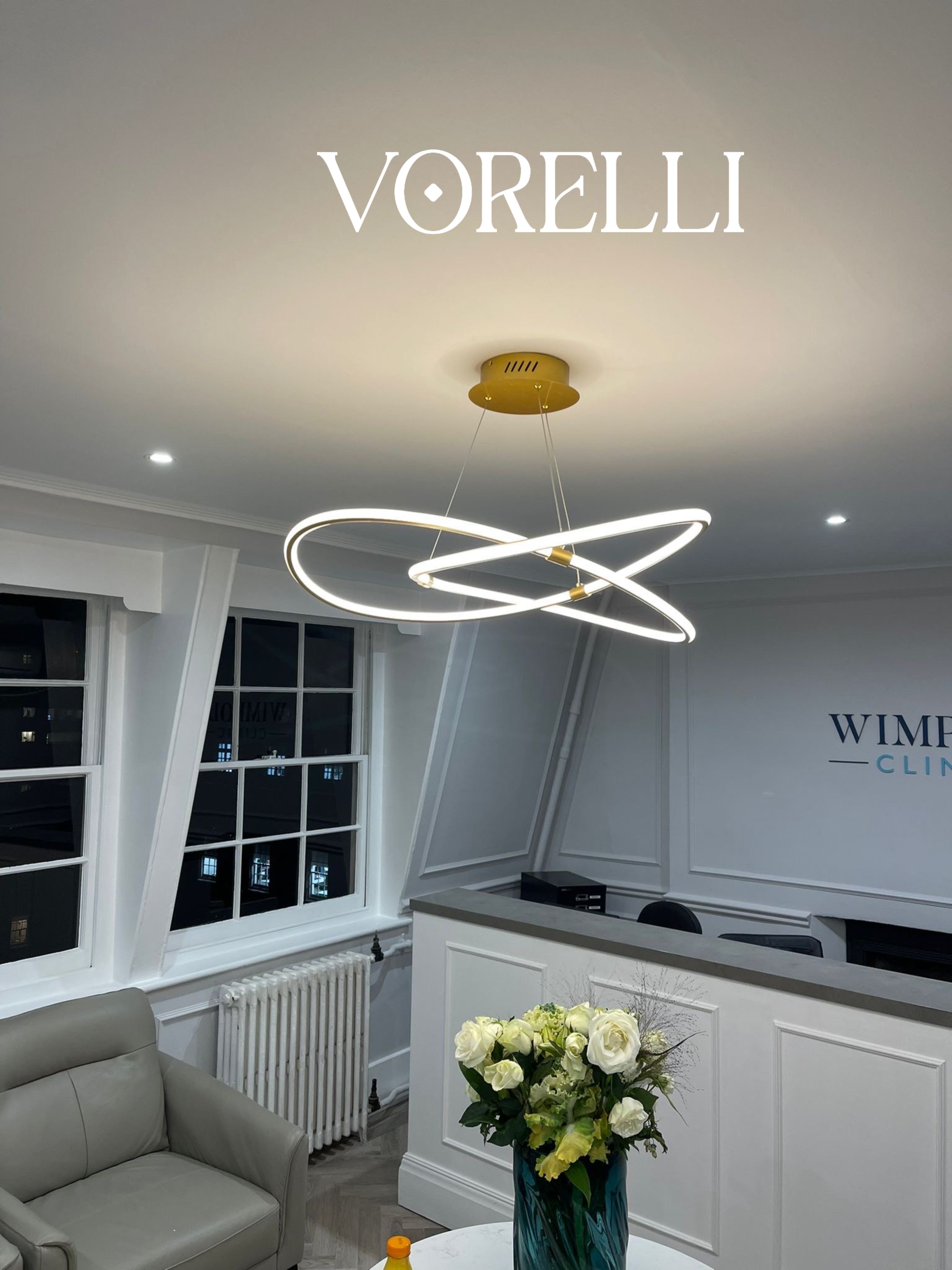 VORELLI Milano sculptural circular LED chandelier displayed in a refined modern interior