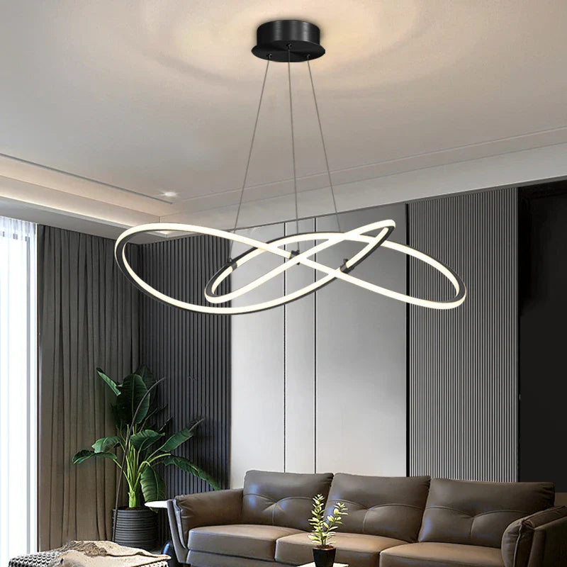 VORELLI Milano circular LED chandelier illuminating a contemporary luxury living space