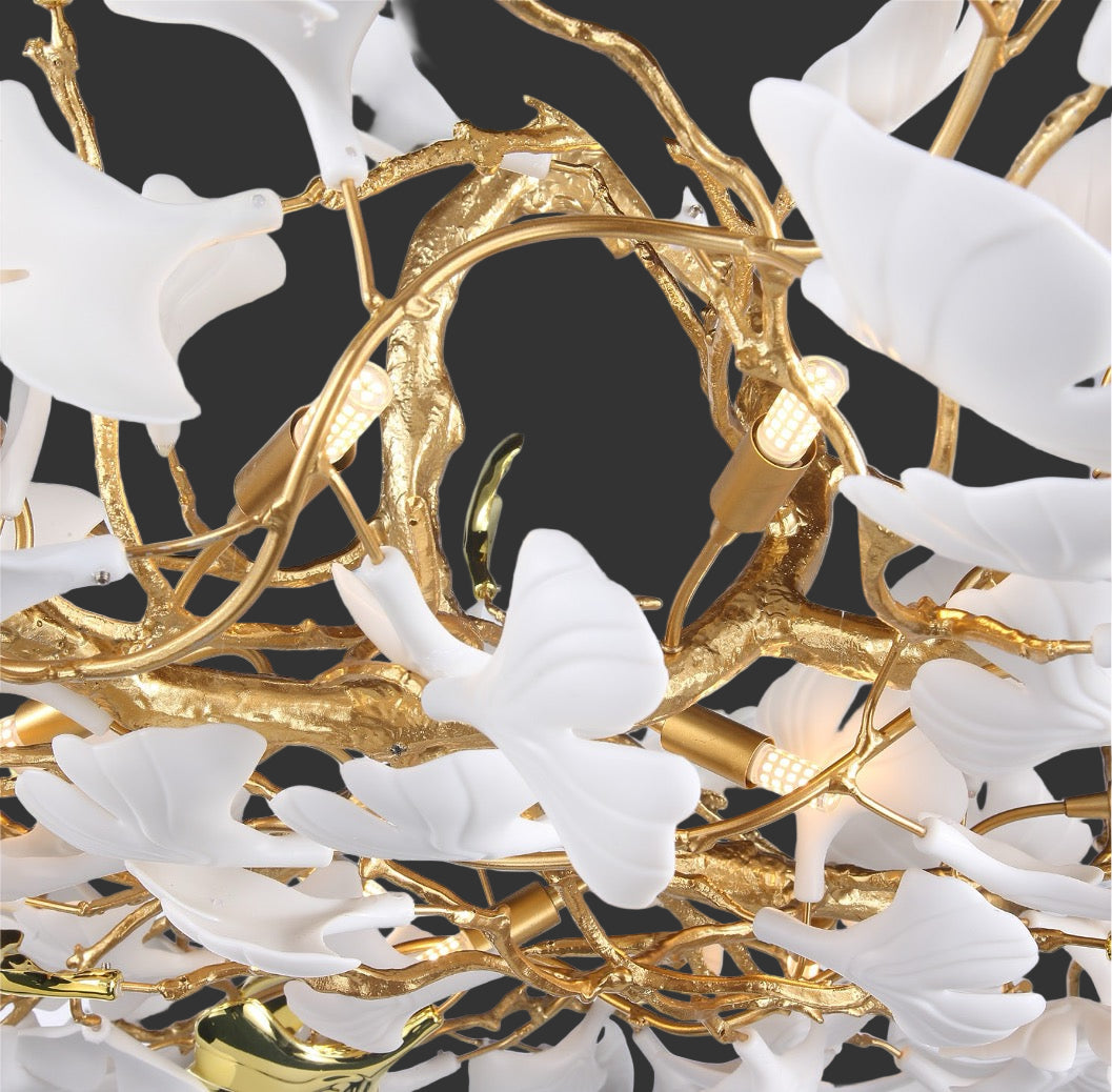 Close-up of Prano floor lamp showing floral glass petals and sculptural branch detailing