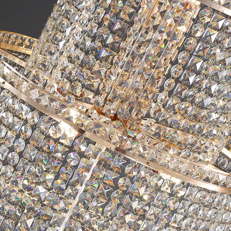 Luxury crystal stairwell chandelier by VORELLI® featuring layered illuminated rings designed for elegant residential and hospitality spaces