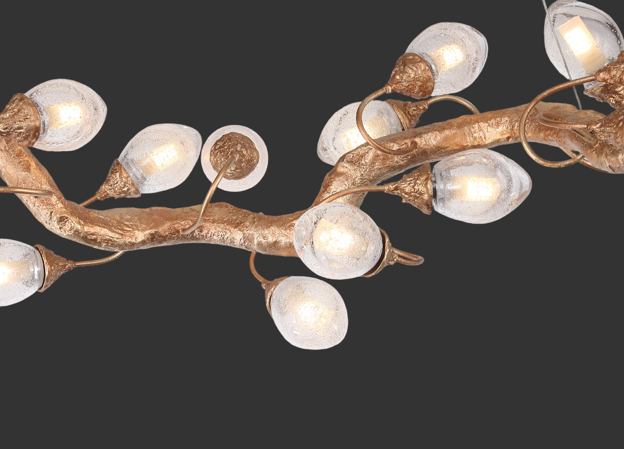 Close-up of sculptural branch frame with textured glass lighting elements