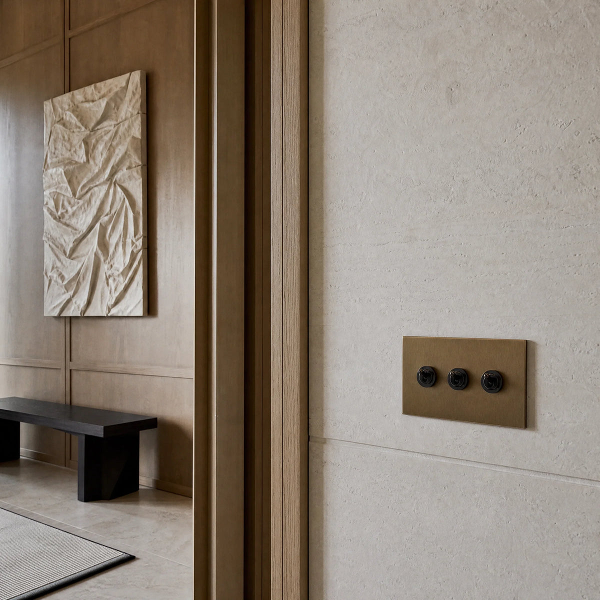 VORELLI® Ambassador Square Toggle Switch, shown on an interior wall in an interior visualisation.