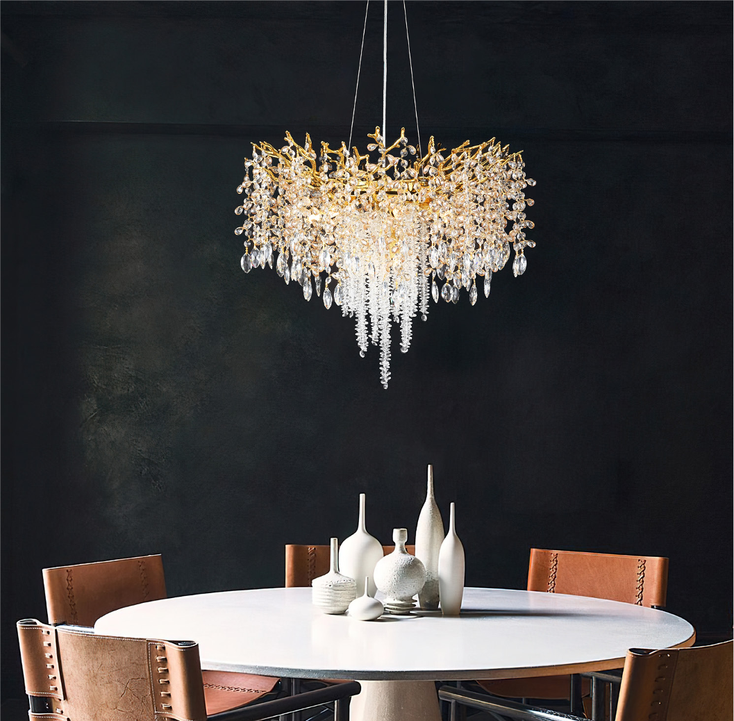 Wisteria Circular Chandelier III styled above a luxury dining table in an elegant interior
