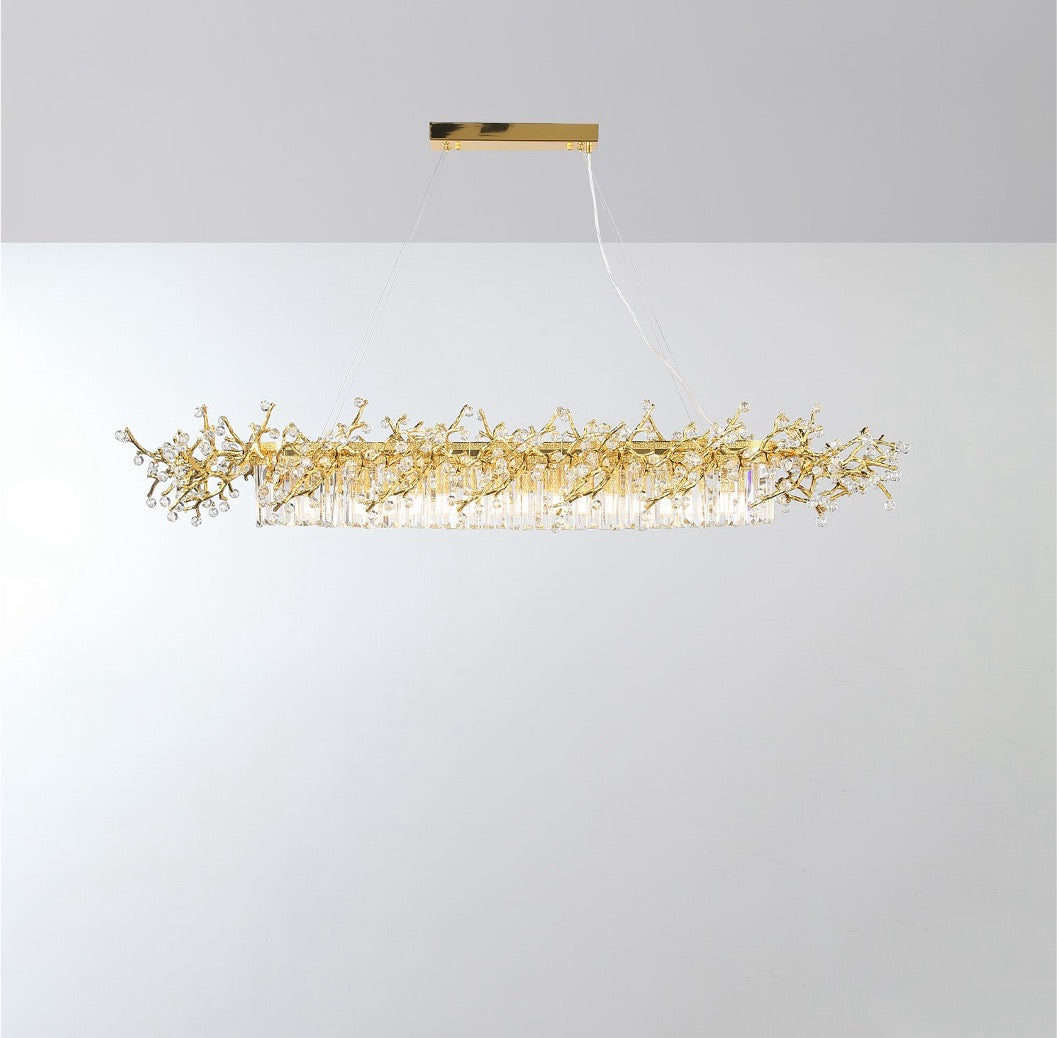 Winterberry rectangular chandelier styled above a luxury dining table