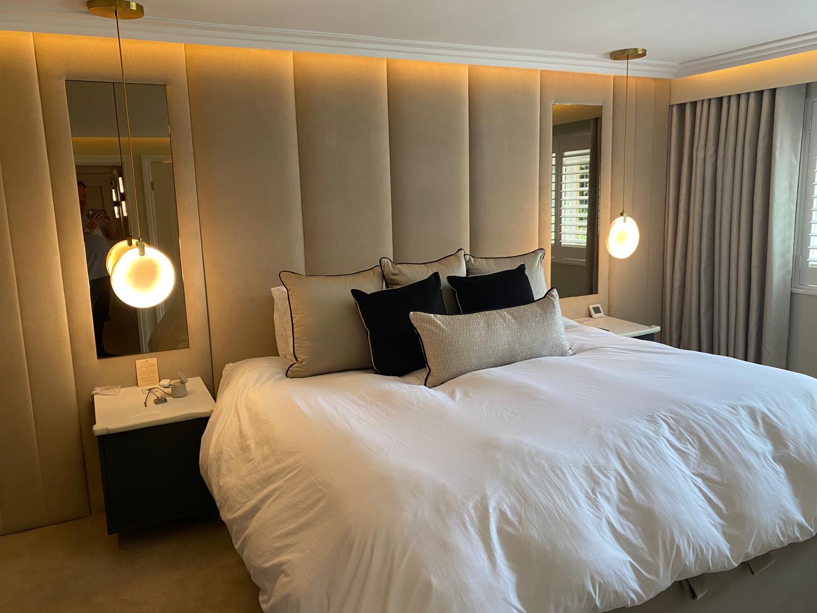 VORELLI® Calacatta Marble Pendant installed in a luxury bedroom setting, adding refined elegance and ambient lighting.