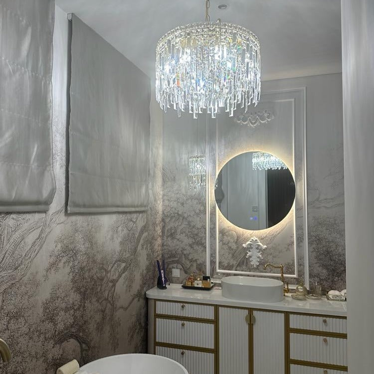 Abruzzi round crystal chandelier installed above luxury bathroom vanity in UAE home