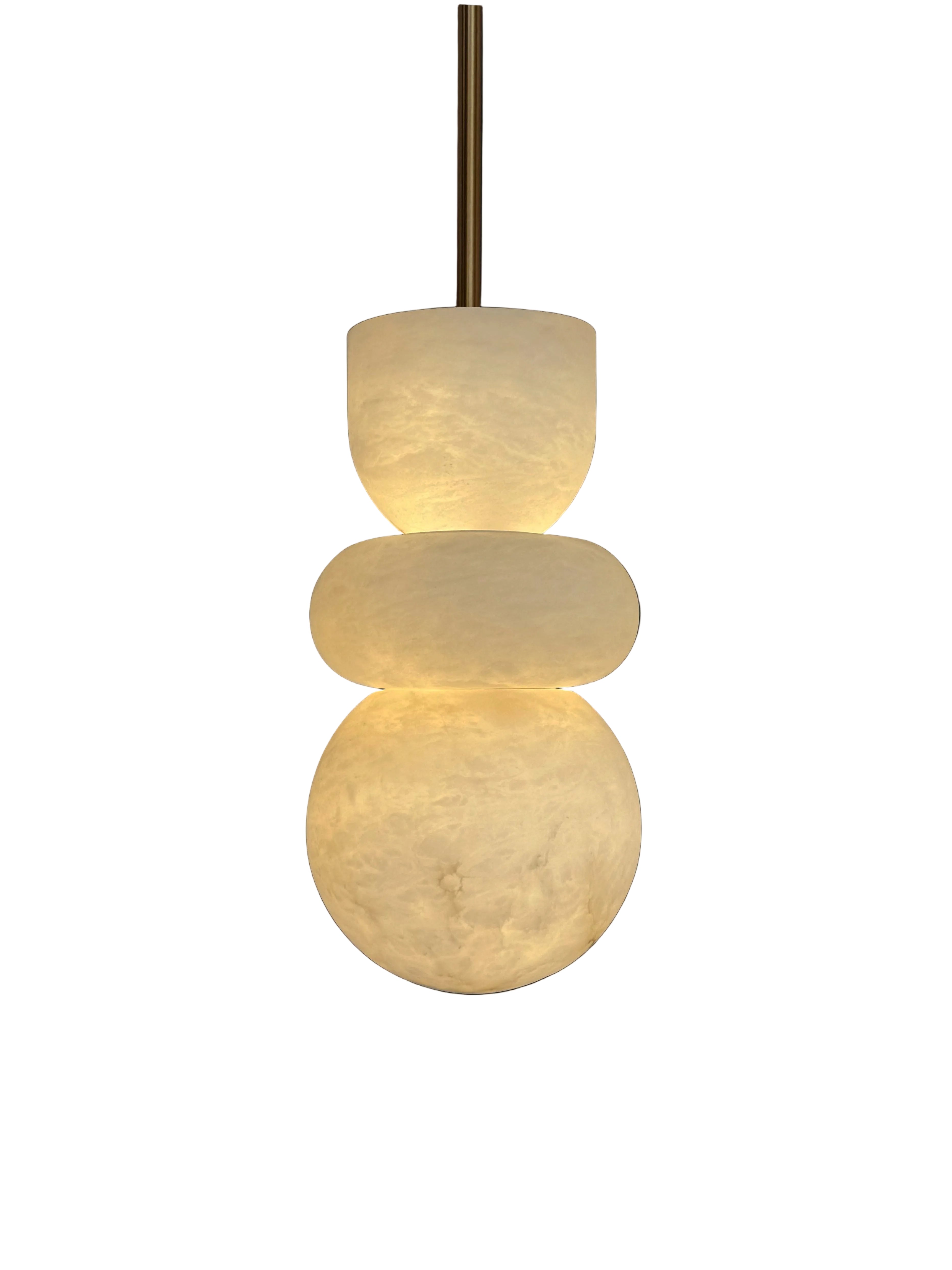 Arco Marble Pendant Light in natural stone with warm ambient glow UAE