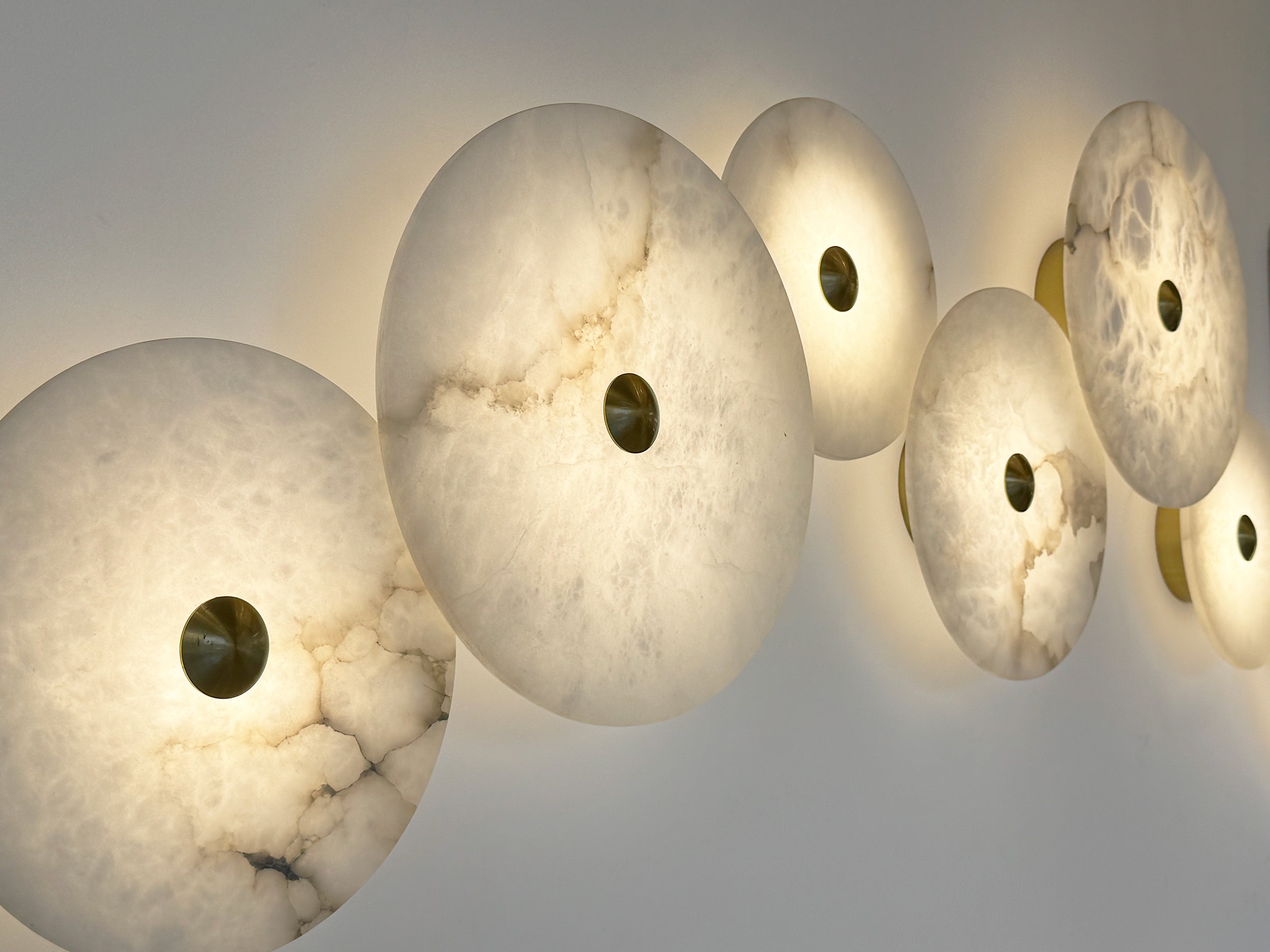 Side view of Aria Marble Wall Light circular marble discs