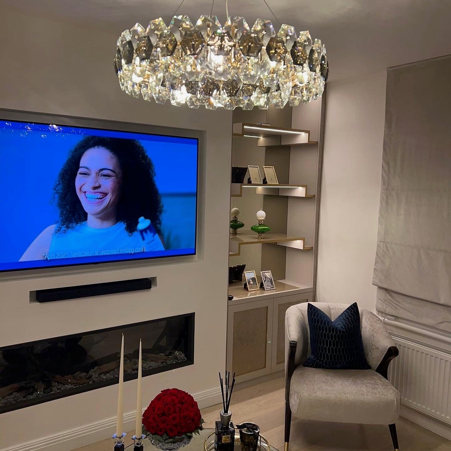 Astoria circular chandelier installed in modern living room