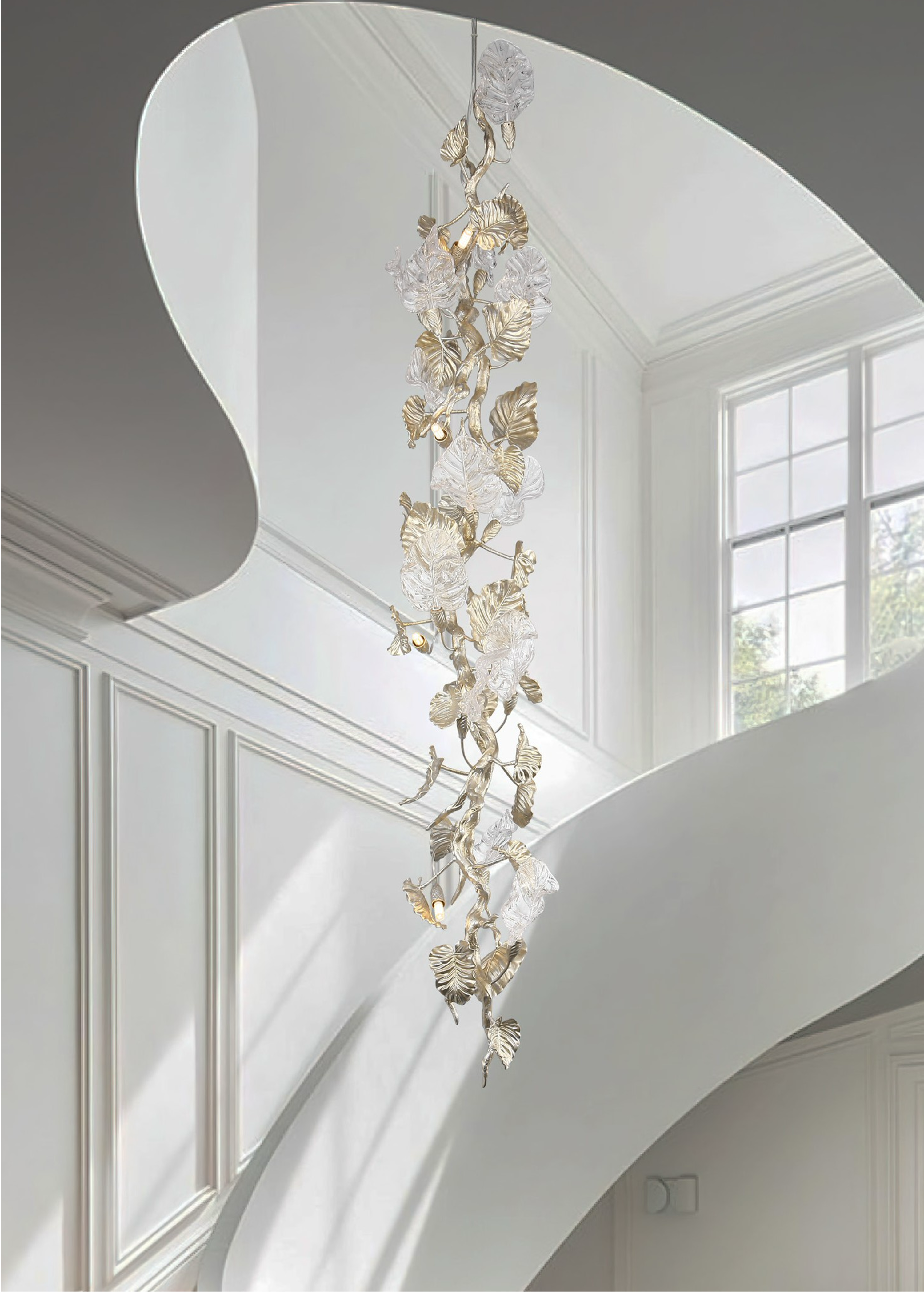 Aura Leaf chandelier installed in double height staircase