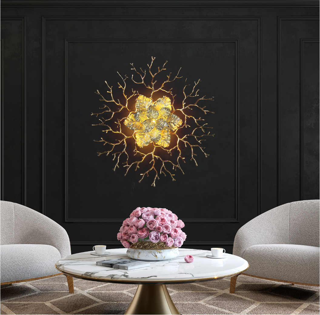 Aurelia Wall Light II illuminated on dark feature wall in luxury interior