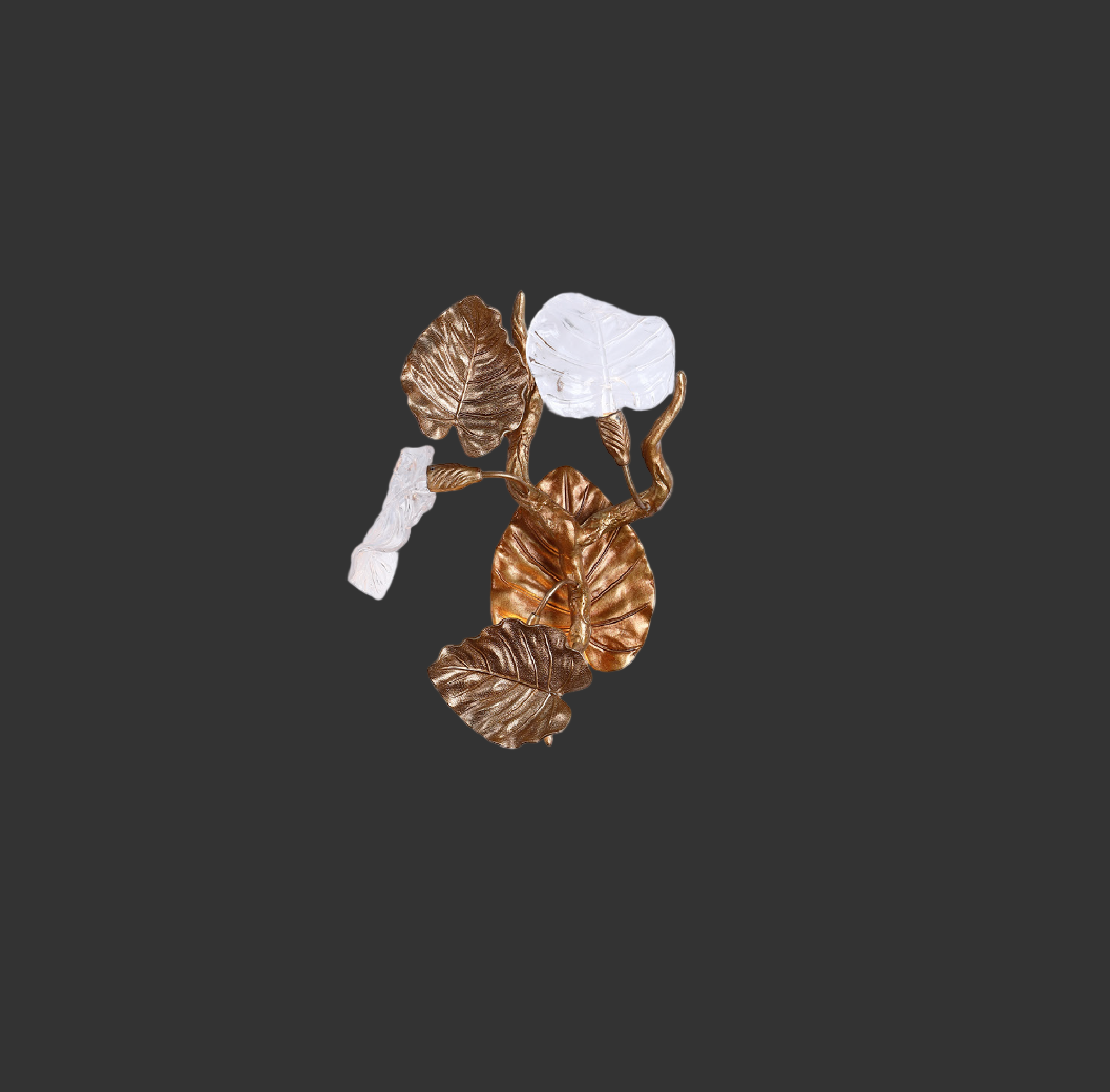 Close-up detail of metallic leaves and crystal accents on Autumn Bloom wall light