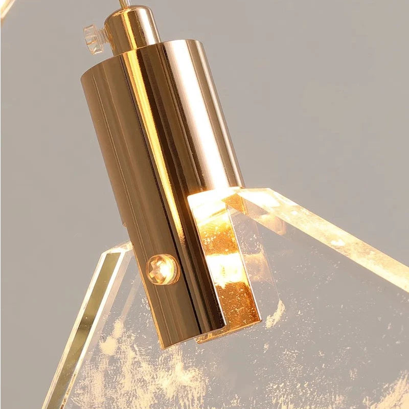 Close-up of textured pentagon crystal pendant on Avellino chandelier