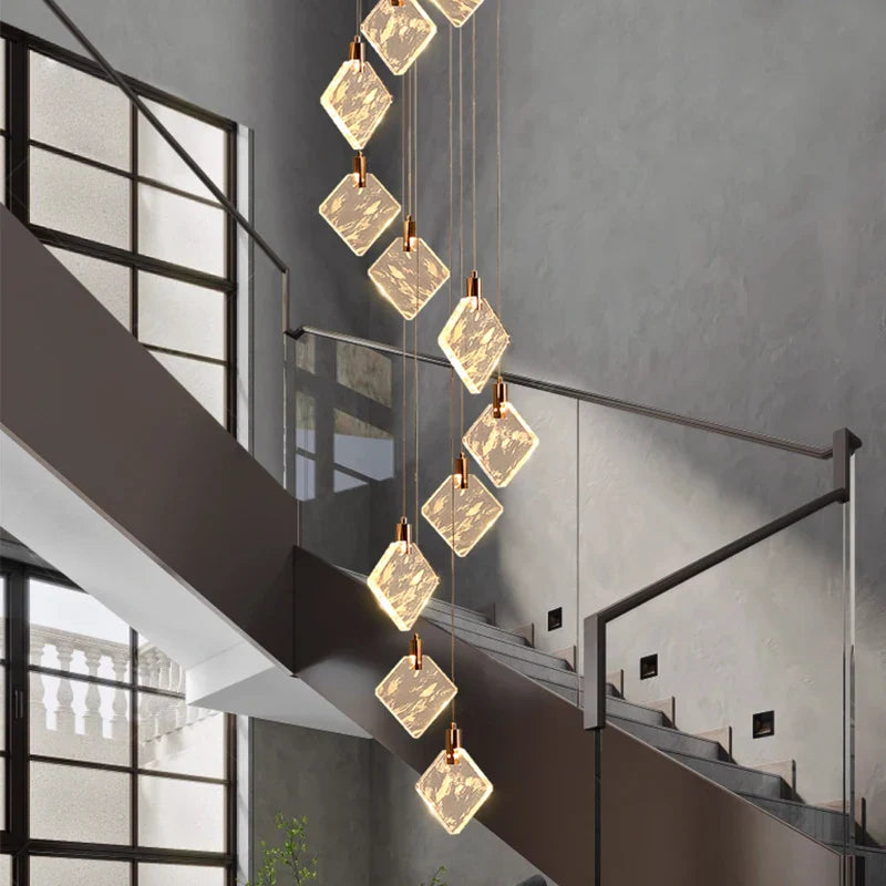 Avellino spiral crystal chandelier installed in modern luxury staircase
