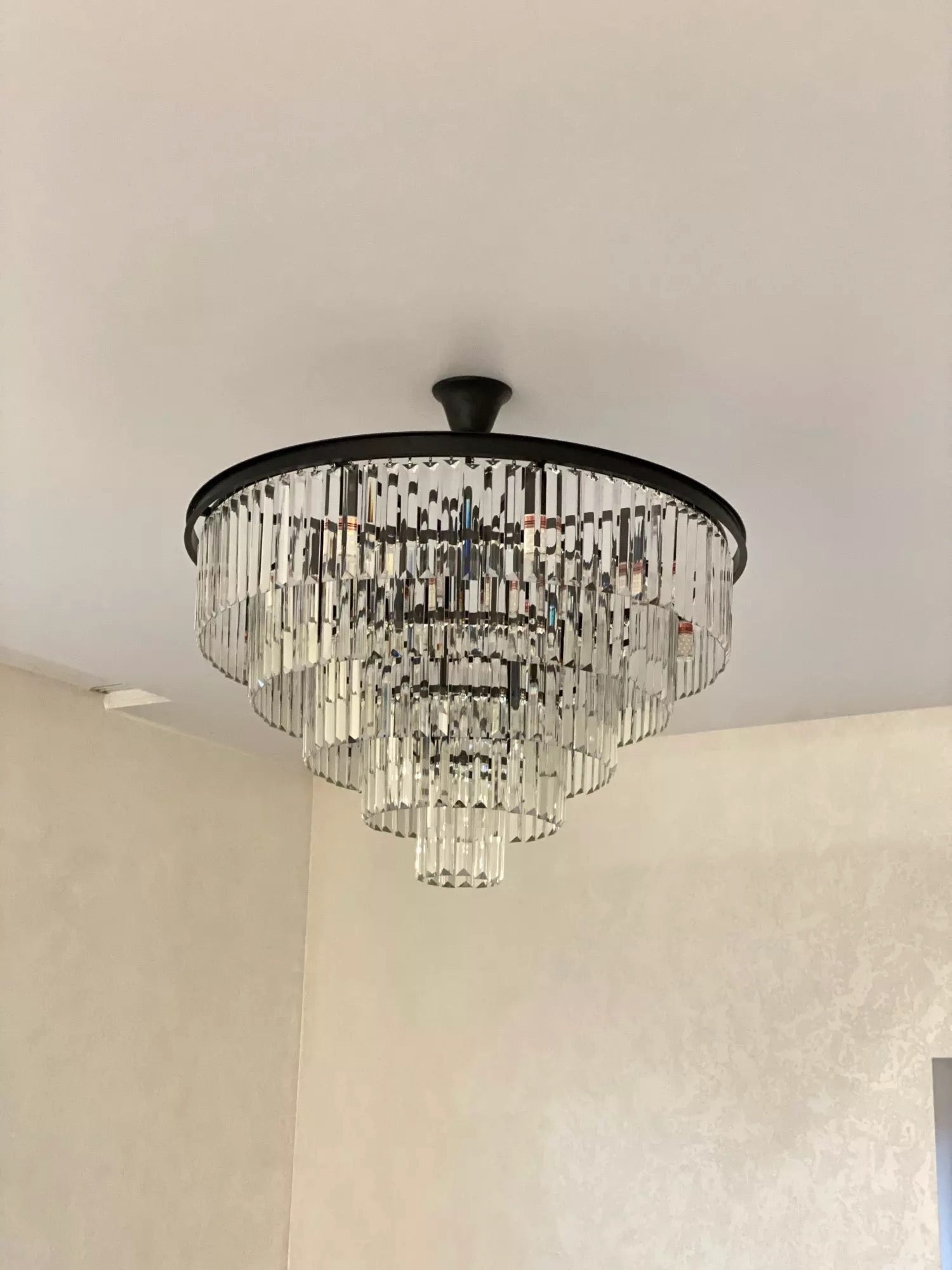 Beckenham circular crystal chandelier in neutral interior