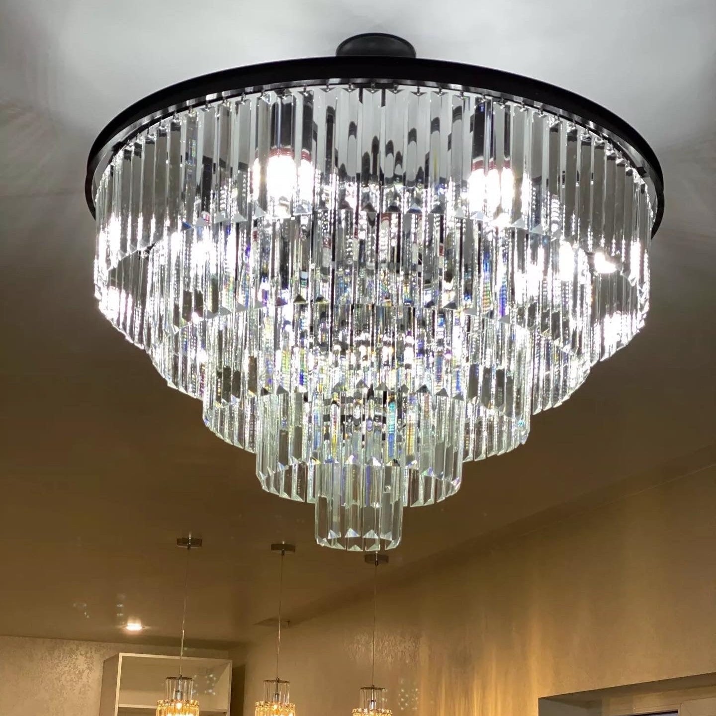 Beckenham circular crystal chandelier installed in luxury interior