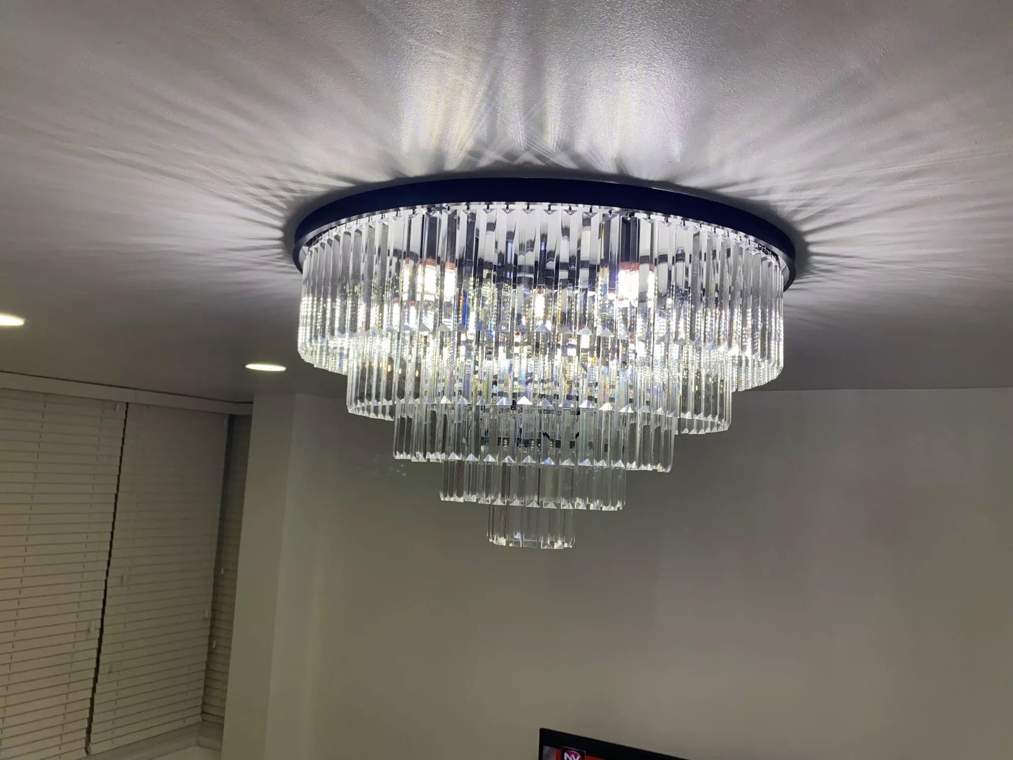 Beckenham tiered crystal ceiling light in modern interior
