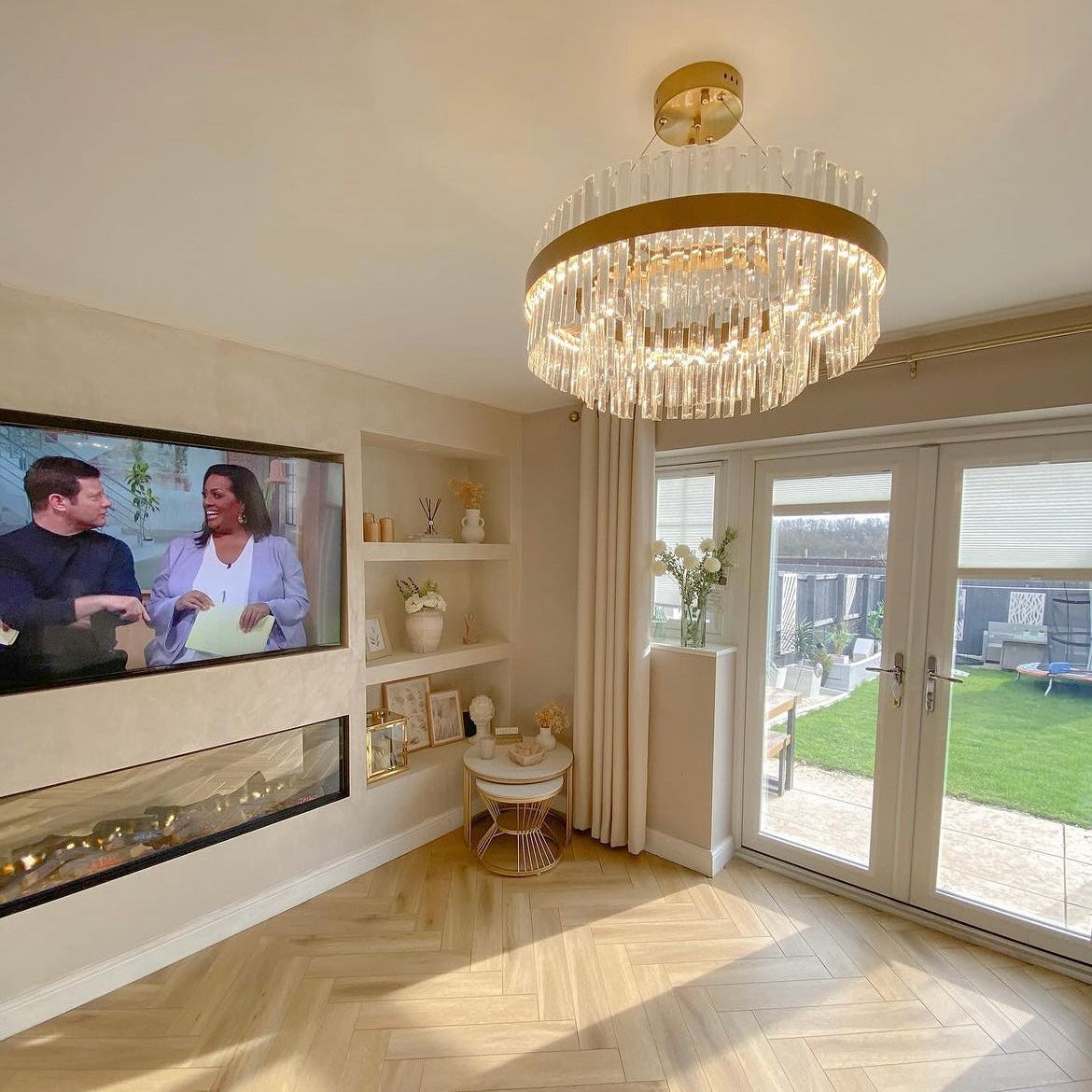 Belair multi-tier crystal chandelier in bright living area