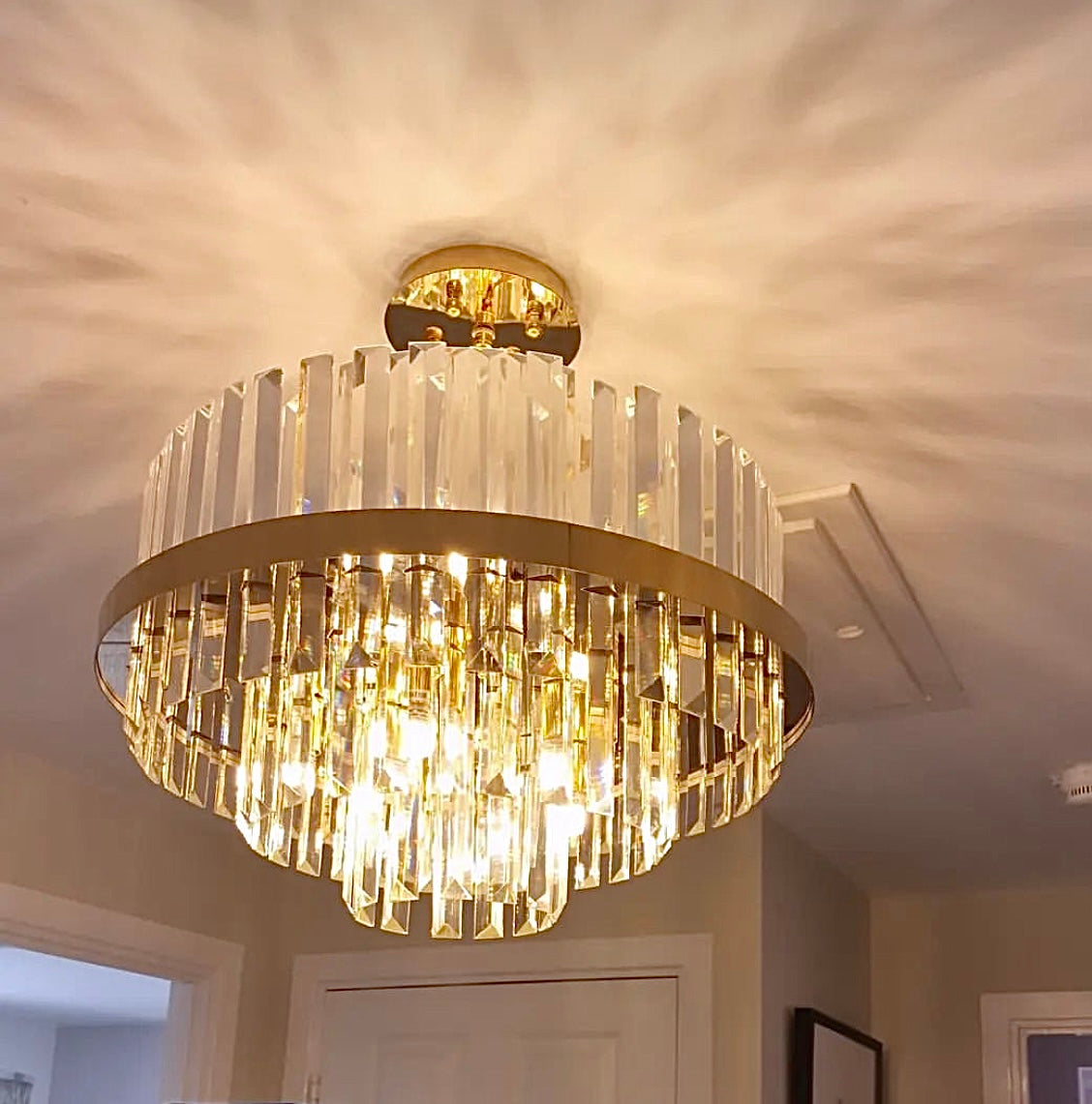 Light reflection pattern from Belair circular chandelier