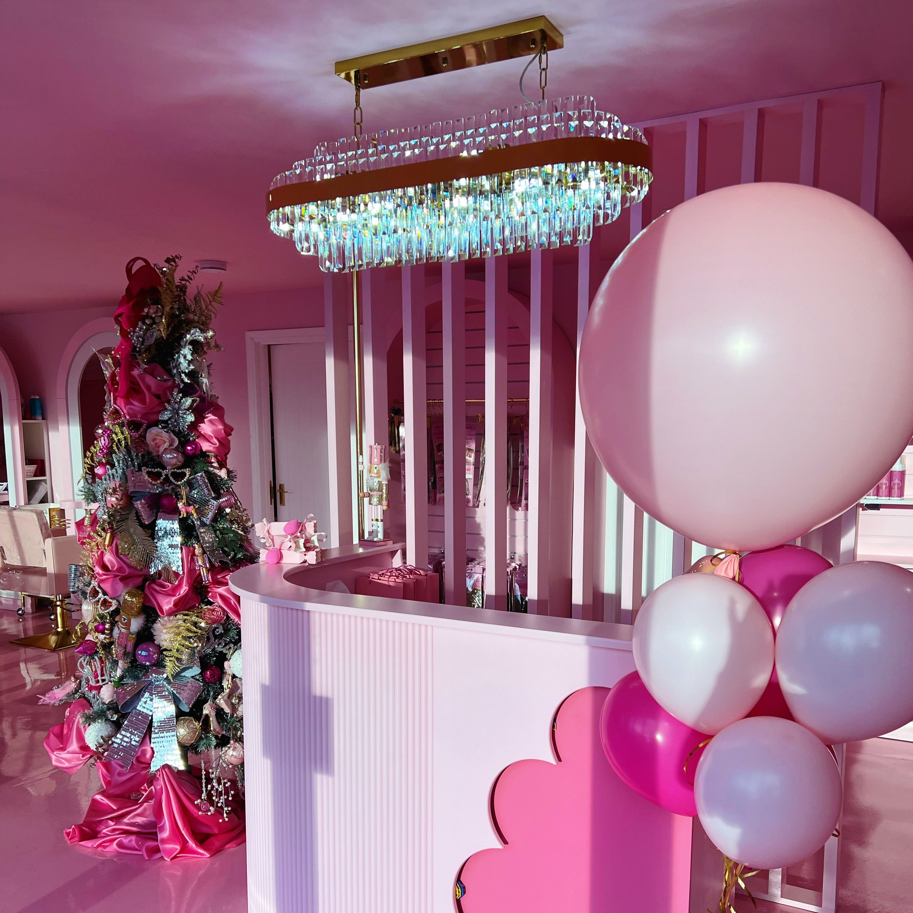 Belair multi-tier rectangular chandelier above bar area