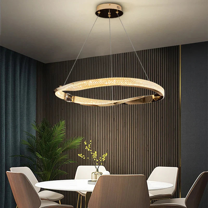 Belgravia circular crystal chandelier above modern dining table