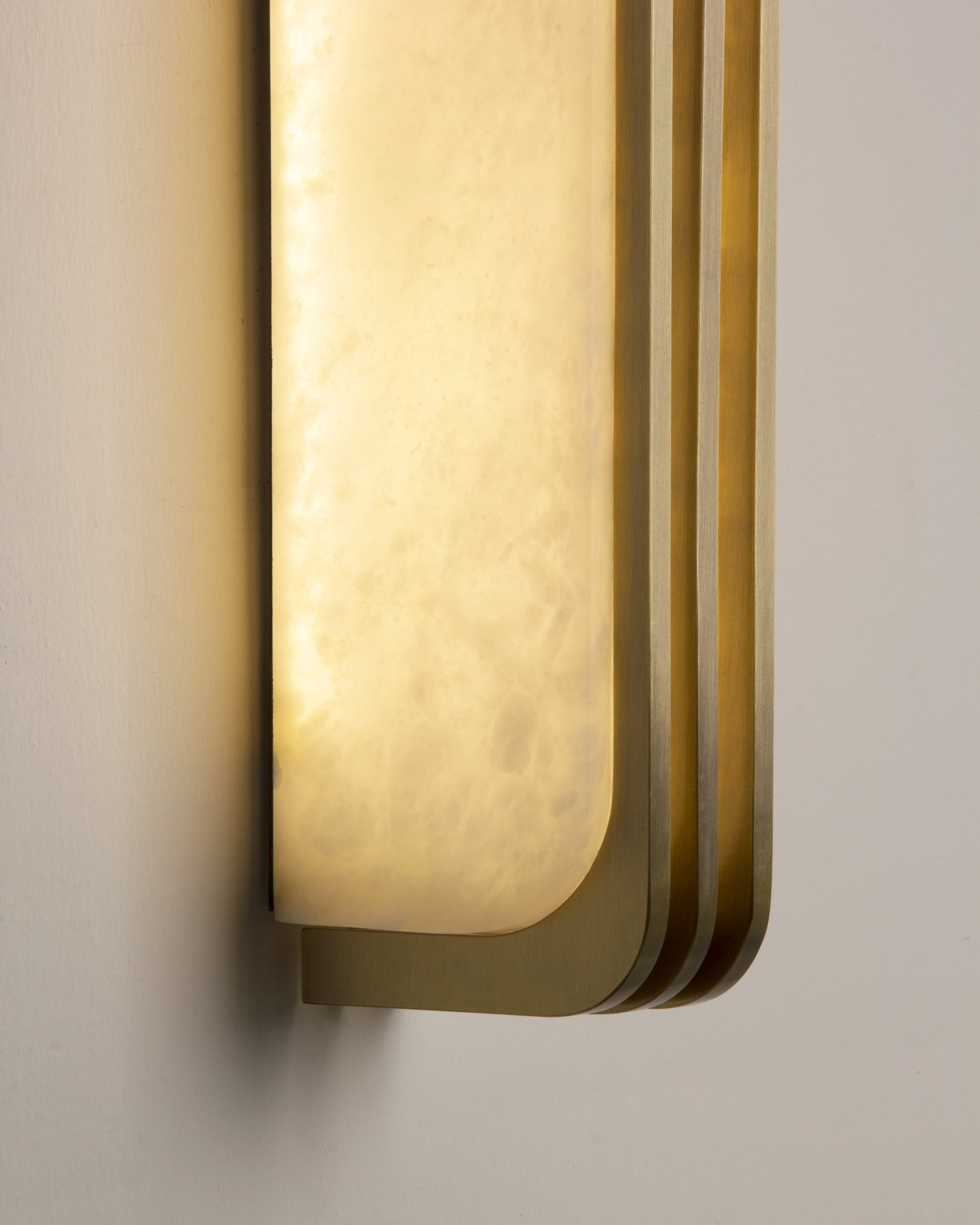 Bellagio marble wall light emitting soft ambient glow