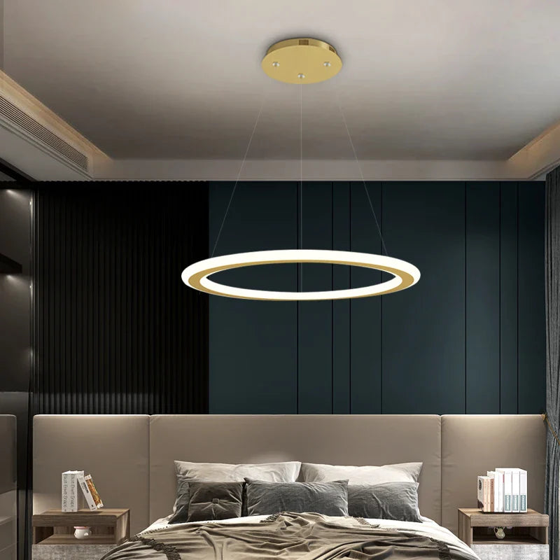 Bellezza halo chandelier installed above modern bedroom