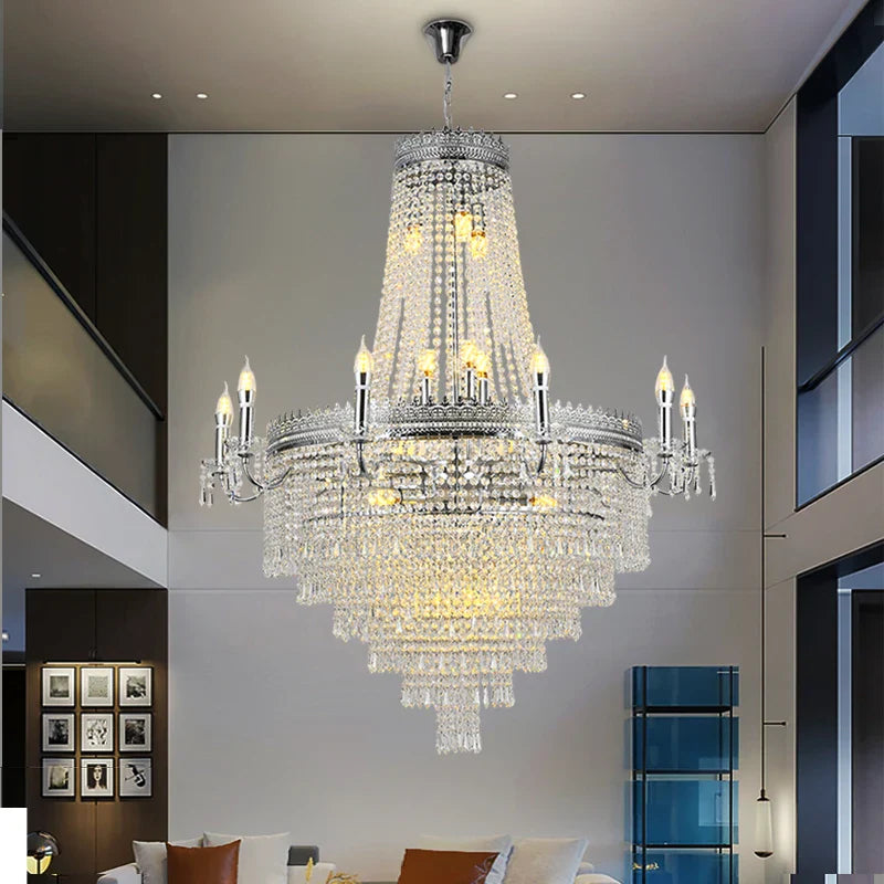 Belmond Grandeur chandelier installed in double-height staircase interior
