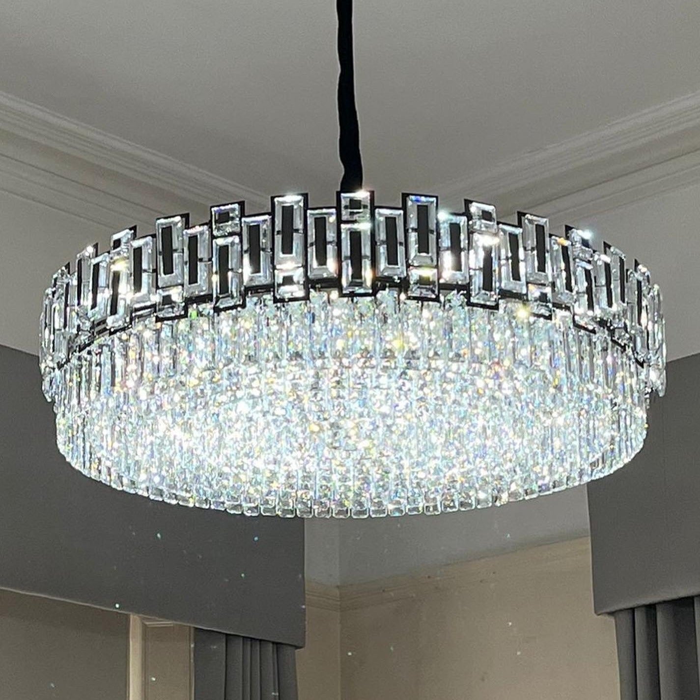 Belvedere circular crystal chandelier installed in modern dining room