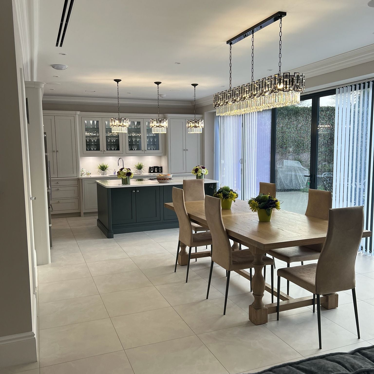 Belvedere rectangular crystal chandelier installed above dining table