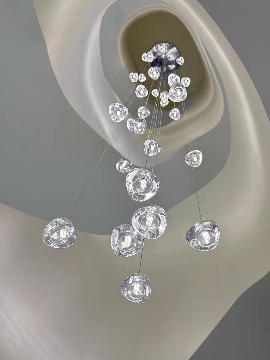 Ceiling canopy and cascading glass pendant arrangement of Biella chandelier