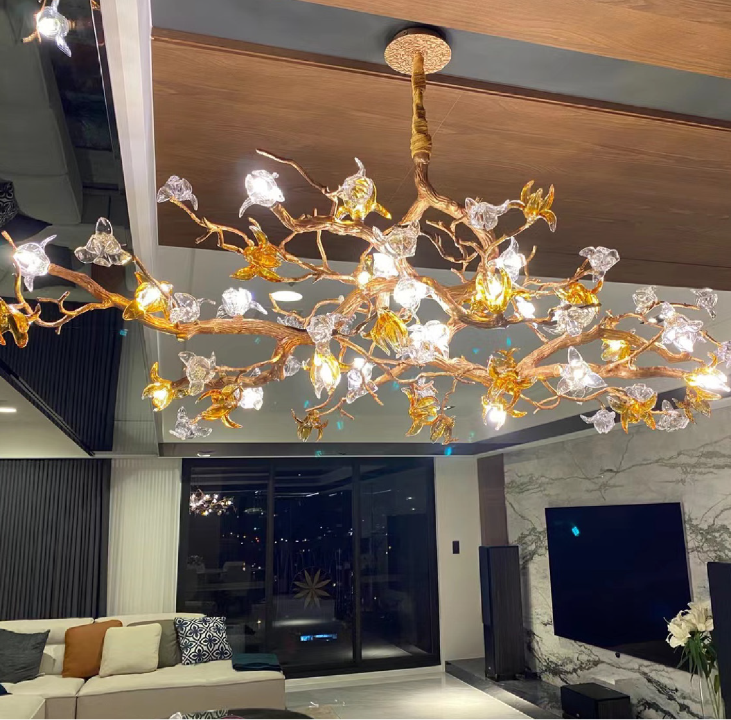 Bloom glass petal rectangular chandelier installed above dining table