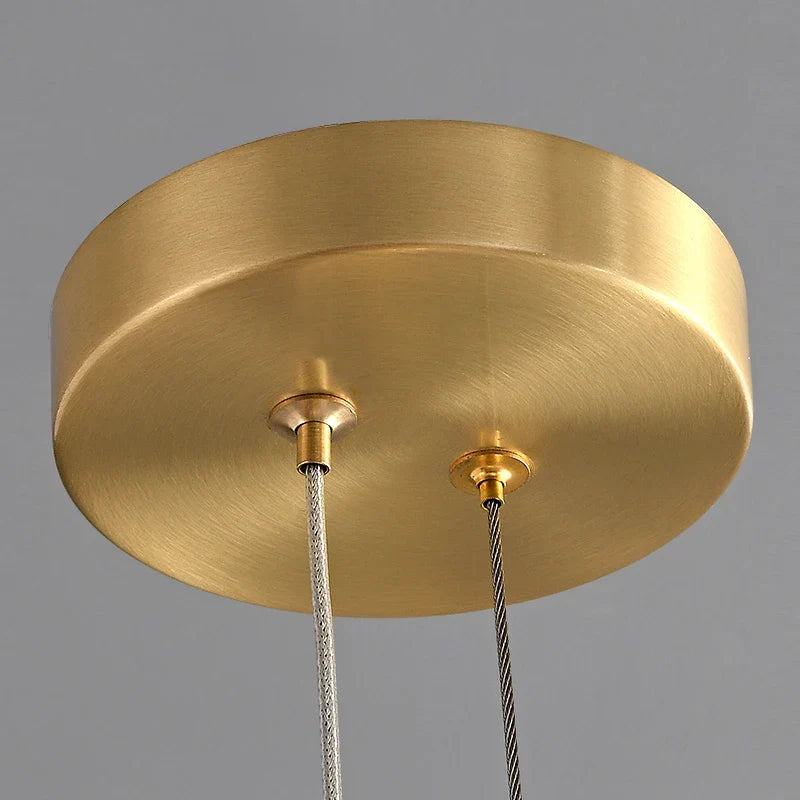 Brushed gold ceiling canopy detail of Bocelli pendant light