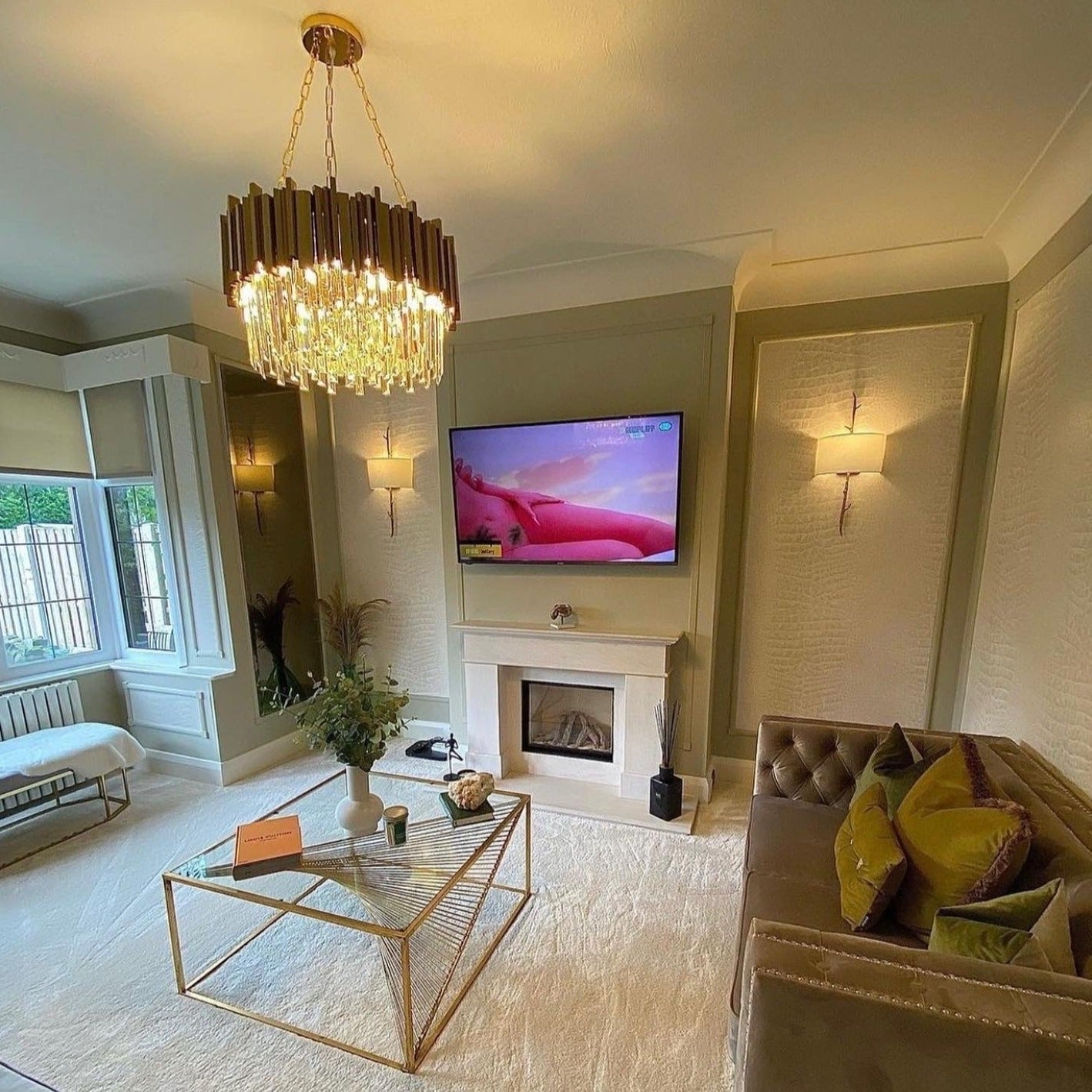 Boeotia circular gold and crystal chandelier in modern living room
