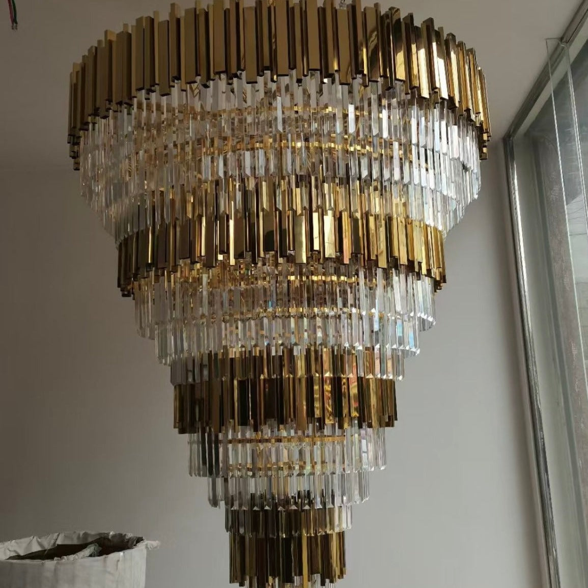 Boeotia Grandeur chandelier with gold cuboid detailing and crystals