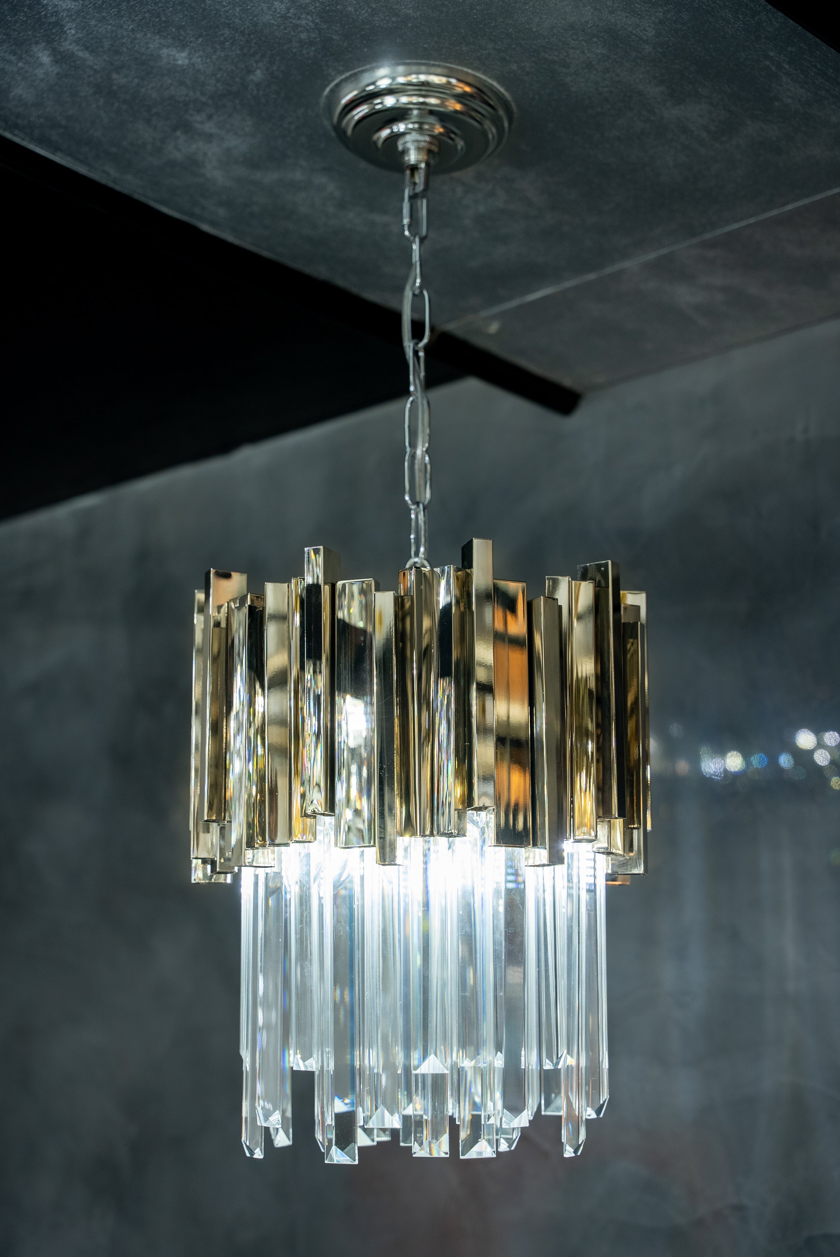 Boeotia gold and crystal pendant against dark backdrop