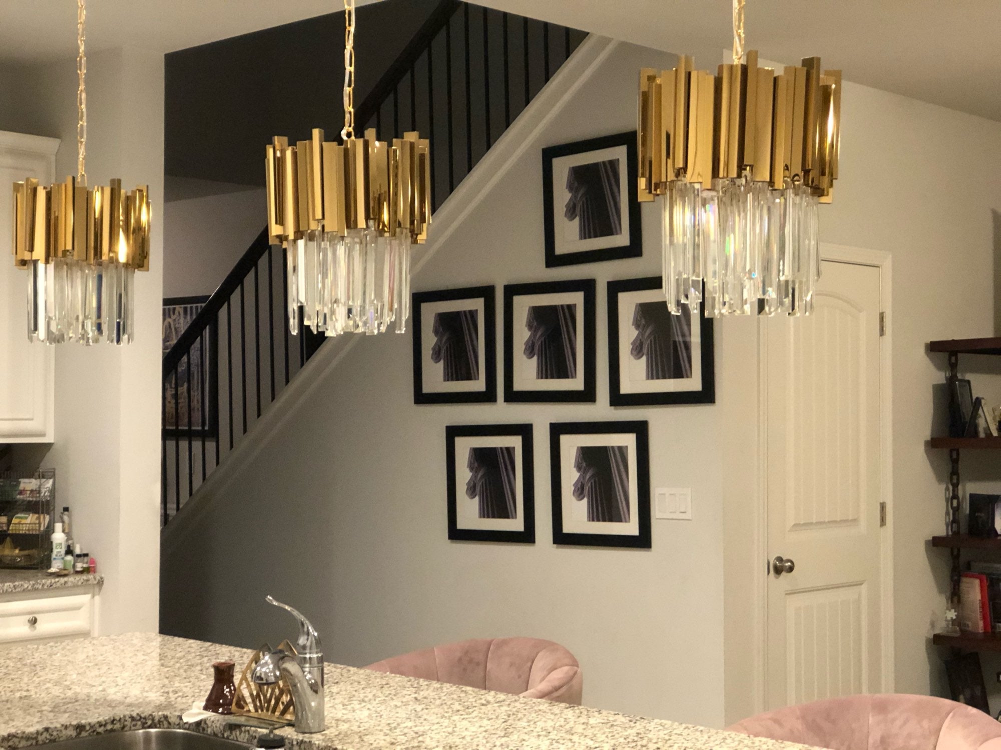 Boeotia gold pendant light in contemporary interior setting
