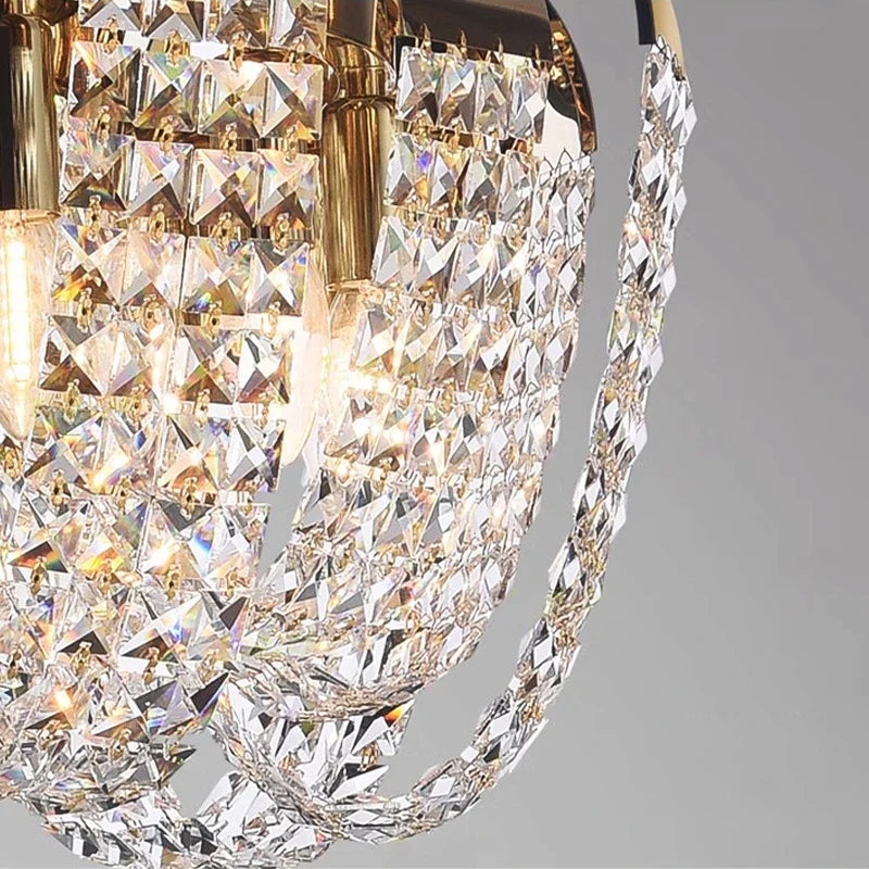 Close-up of diamond cut square crystals on circular chandelier