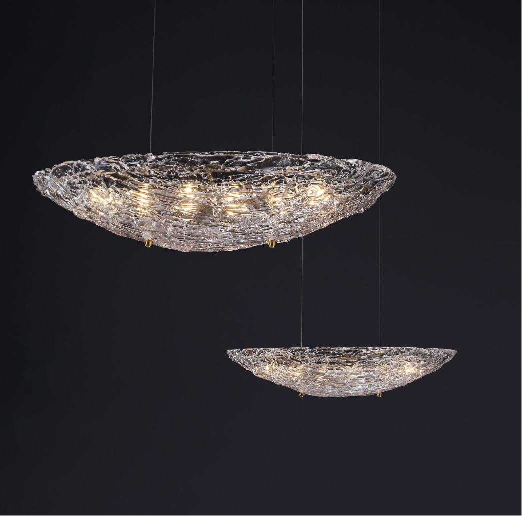 Sculpted glass pendant lights with warm ambient glow