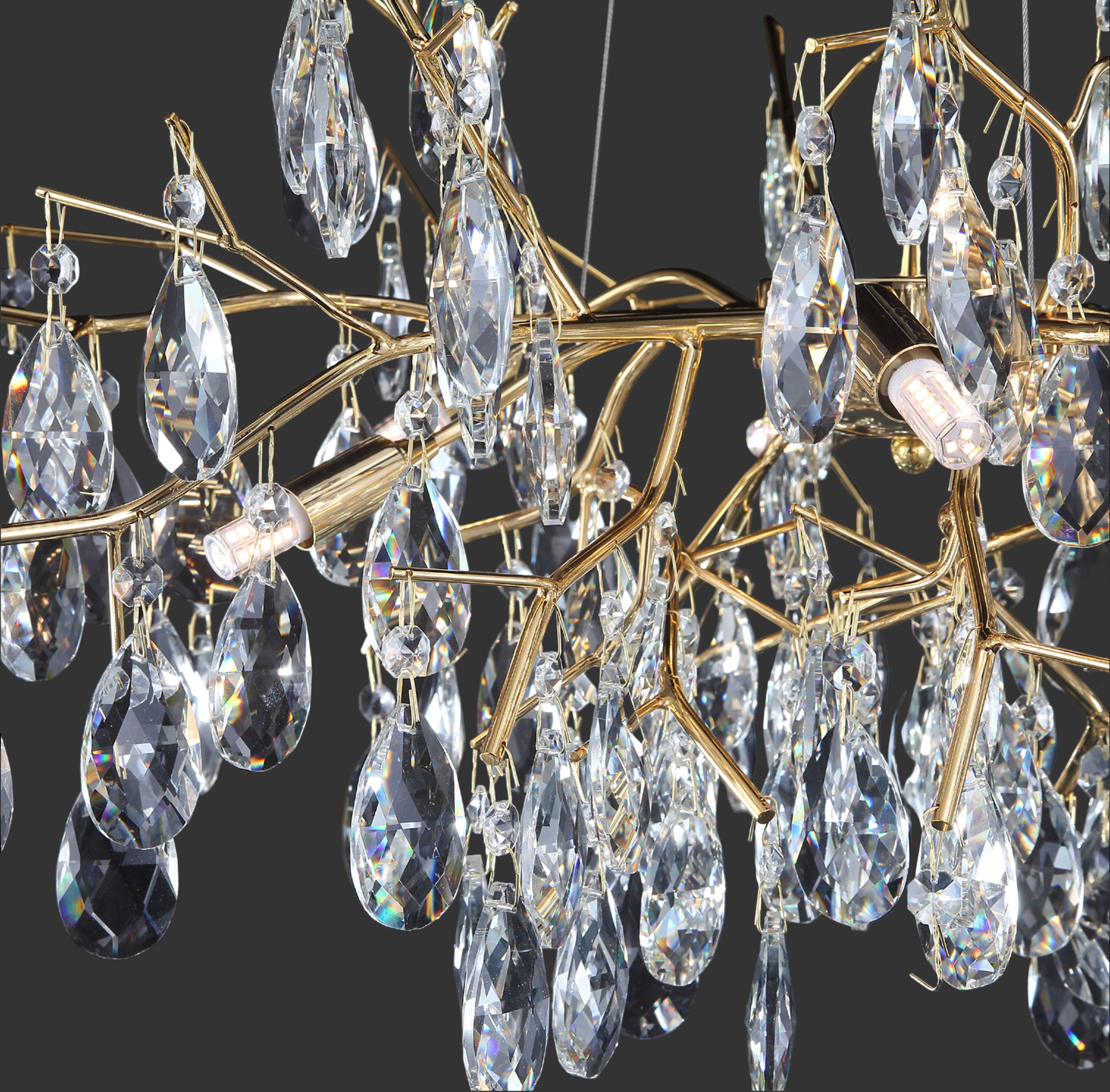 Close-up of Dewdrop circular chandelier showing cascading crystal drops suspended from an intricate gold frame