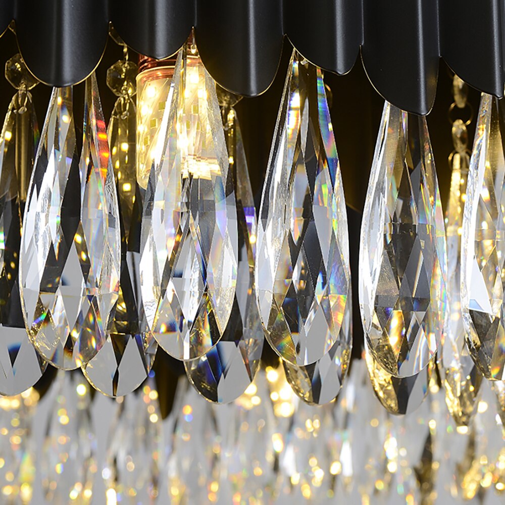 Close-up of diamond cut teardrop crystals beneath the rectangular frame