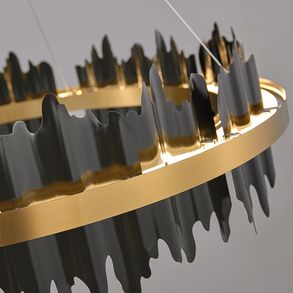 Close-up of gold frame and sculptural fins on the Douala Circular Chandelier