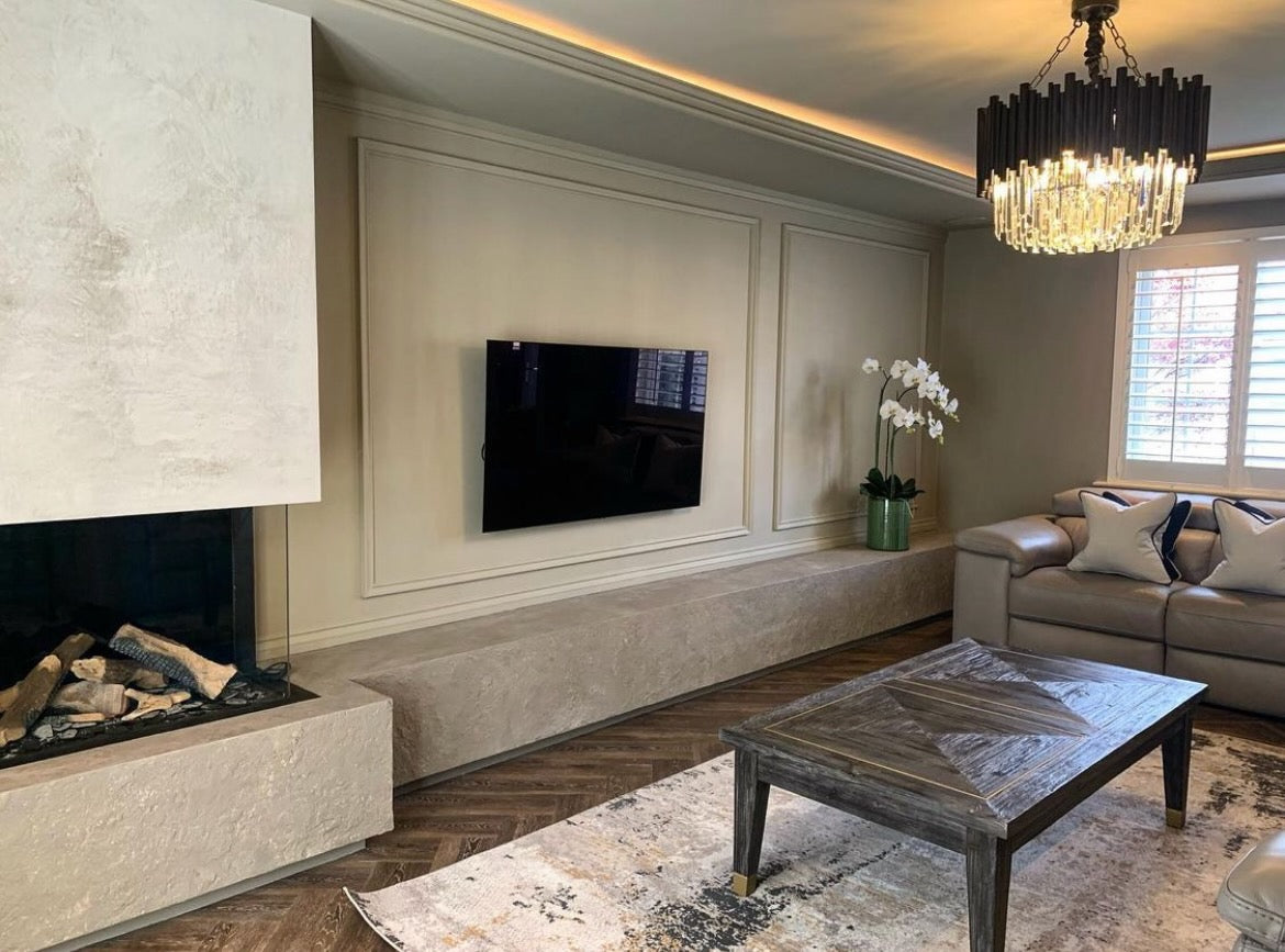 Gotham circular chandelier lighting a modern open plan living space