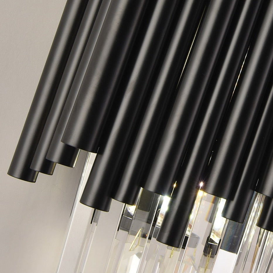 Close-up detail of Gotham wall light crystal bars and vertical metal rod design