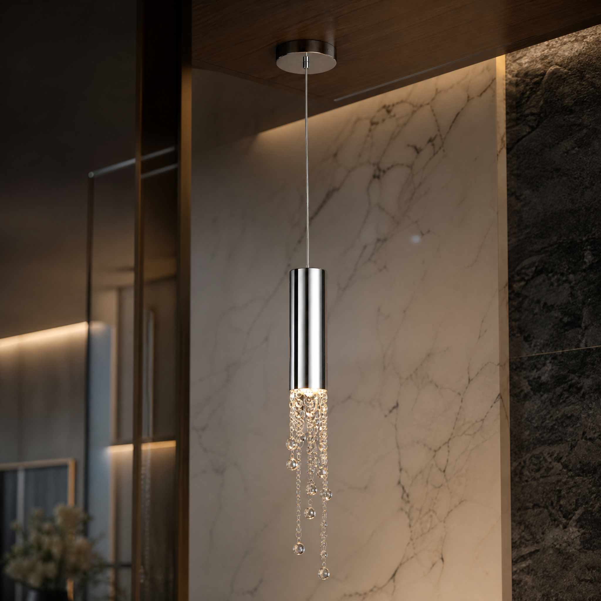 A detailed close-up shot of the Grosvenor pendant's sleek cylinder frame and intricate diamond-cut octagon crystal chains.