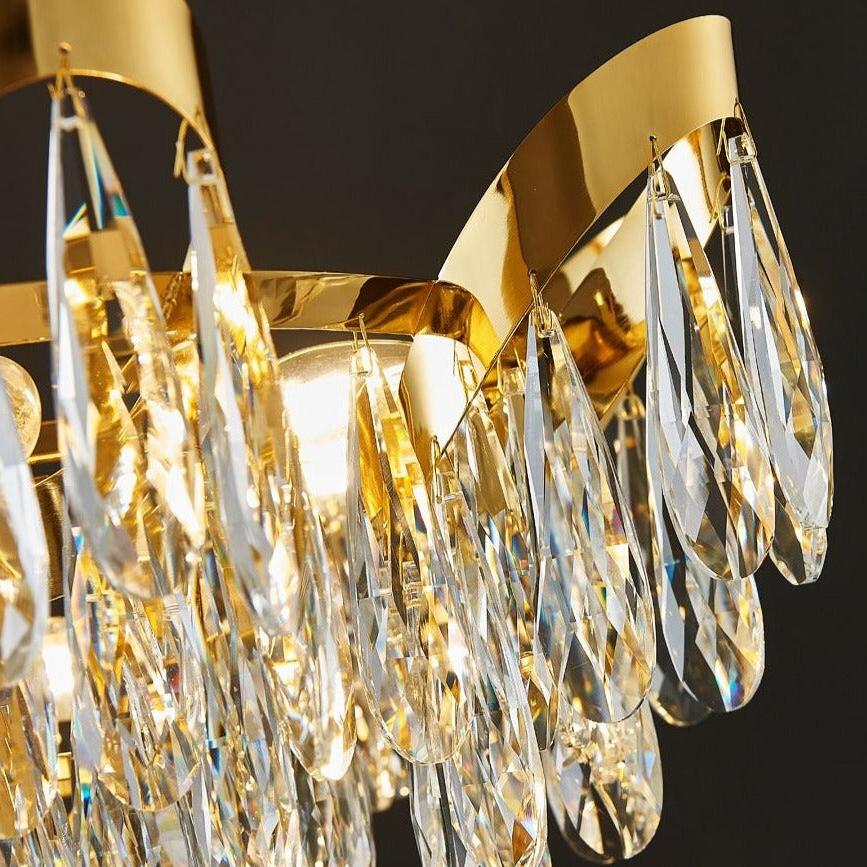 Isso Circular Chandelier close up of faceted diamond cut teardrop crystal detailing and sculptural frame