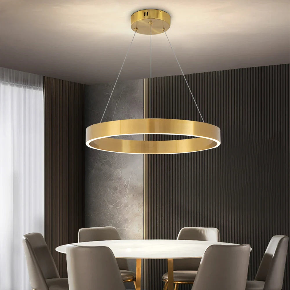 Jobson Ring Circular Chandelier suspended above a dining table within a refined modern interior