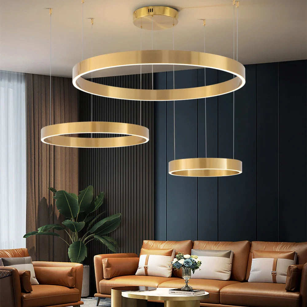 Jobson Trio Circular Chandelier suspended within a refined modern living room interior